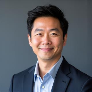 佐藤 健司氏のプロフェッショナルな顔写真