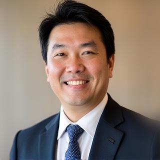 鈴木 一郎氏のプロフェッショナルな顔写真